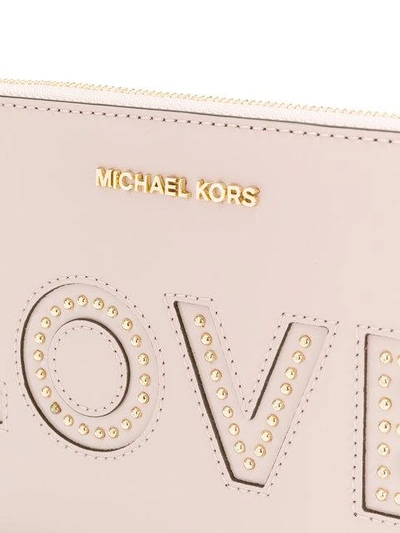 Shop Michael Michael Kors Mercer Love Wristlet In Pink