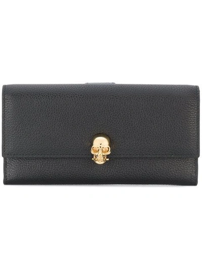 Shop Alexander Mcqueen Continental Skull Wallet In Black