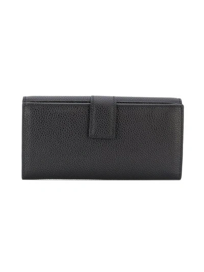 Shop Alexander Mcqueen Continental Skull Wallet In Black