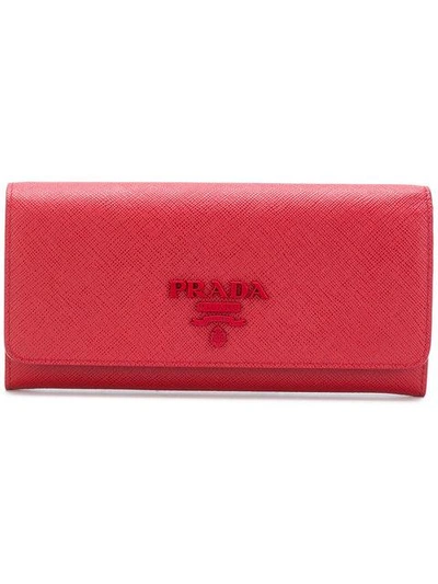 Shop Prada Saffiano Continental Wallet - Red