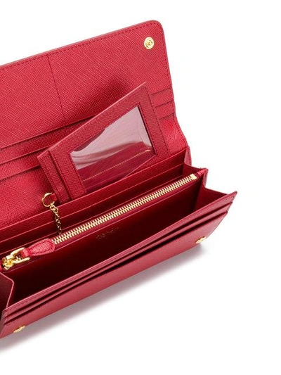 Shop Prada Saffiano Continental Wallet - Red