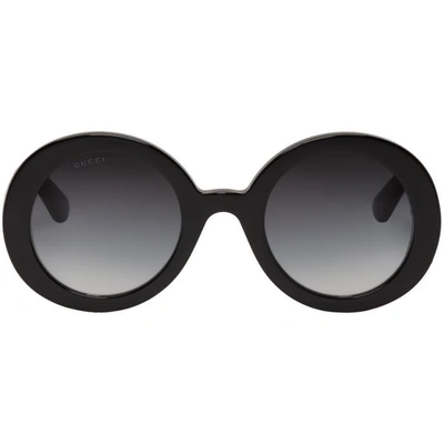 Shop Gucci Black Round Gg Sunglasses In 001 Black
