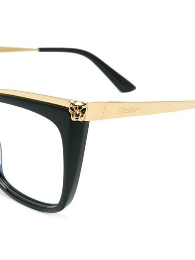 Shop Cartier Cat Eye Glasses In Black
