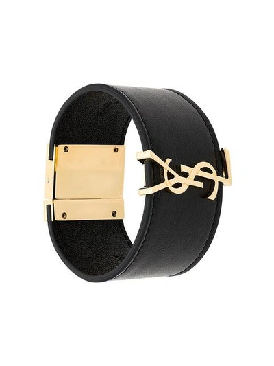 Shop Saint Laurent Monogram Cuff Bracelet - Black