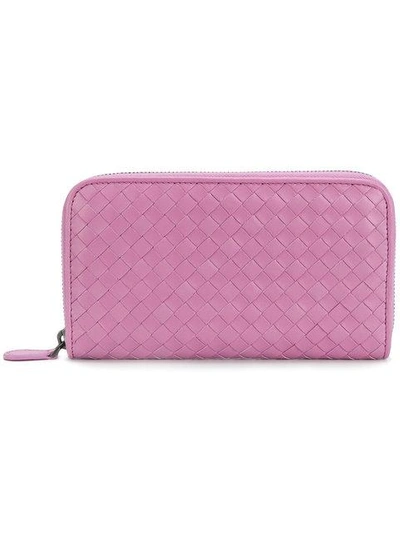 Shop Bottega Veneta Twilight Intrecciato Nappa Zip-around Wallet - Pink