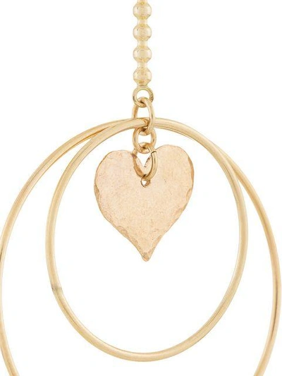Shop Petite Grand Heart/dove Circle Earrings - Metallic