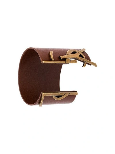 Shop Saint Laurent Logo Embellished Bracelet In Brown