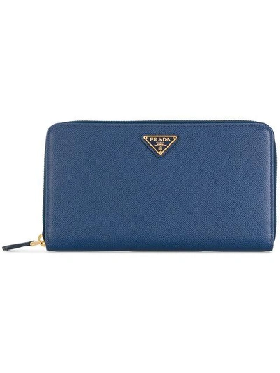 Shop Prada Saffiano Zip Wallet In Blue
