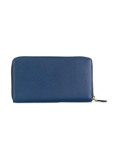Shop Prada Saffiano Zip Wallet In Blue