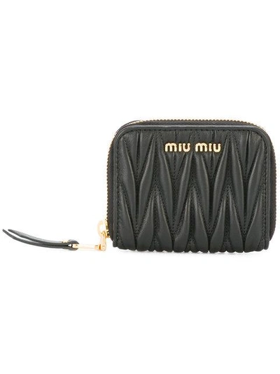 Shop Miu Miu Lettering Logo Zipped Purse In Black