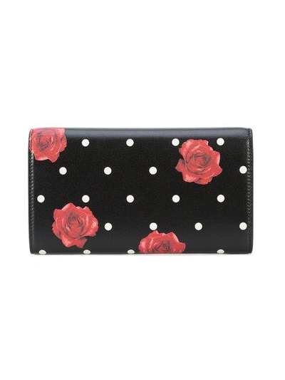 Shop Saint Laurent Rose Print Foldover Wallet In Black
