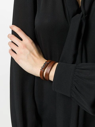 Shop Saint Laurent Signature Cuff In Brown