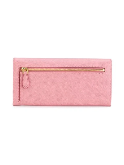 Shop Prada Saffiano Continental Wallet - Pink