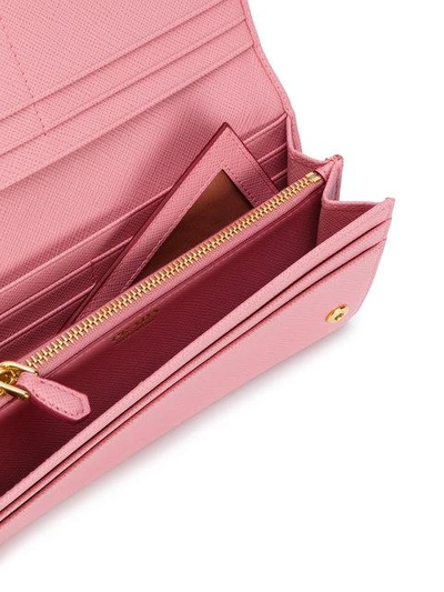 Shop Prada Saffiano Continental Wallet - Pink