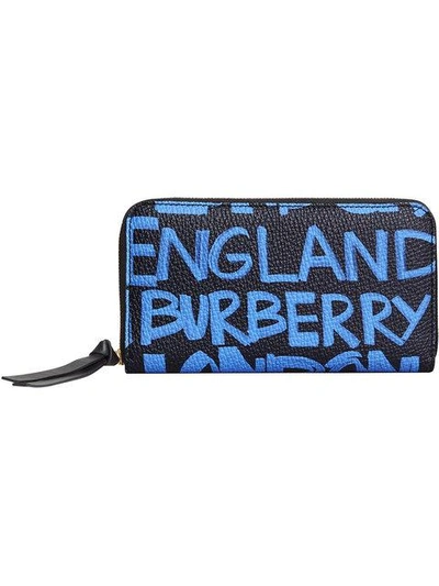 Shop Burberry Graffiti Print Leather Ziparound Wallet - Blue