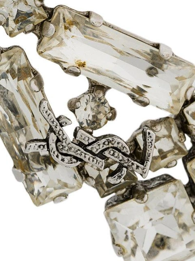 Shop Saint Laurent Crystal Logo Earrings - Metallic