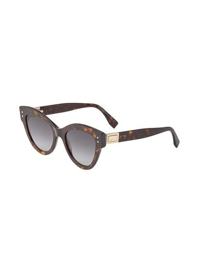 Shop Fendi Eyewear Peekaboo Sunglasses - Brown