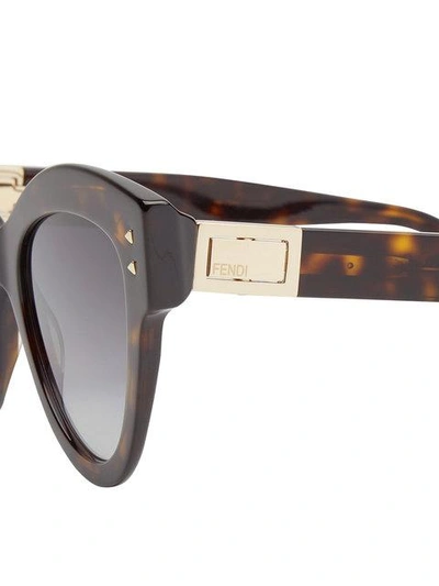 Shop Fendi Eyewear Peekaboo Sunglasses - Brown