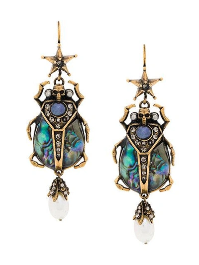 Shop Alexander Mcqueen Skull Insect Earrings - Metallic