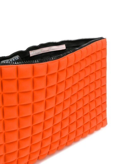 large grid textured pouch