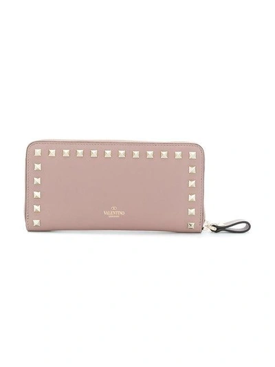 Shop Valentino Rockstud Zip-around Wallet In Pink