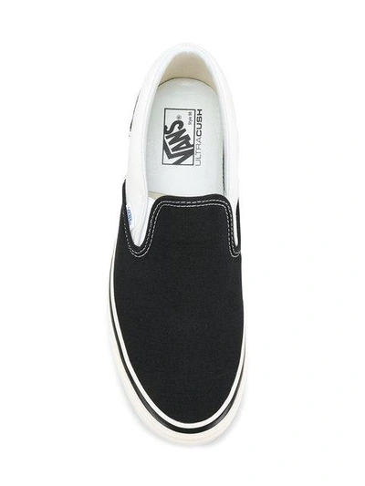 Shop Vans Classic Slip-on Trainers In Black