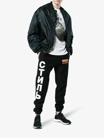 Shop Adidas Originals Nmd_racer Primeknit Sneakers In Black