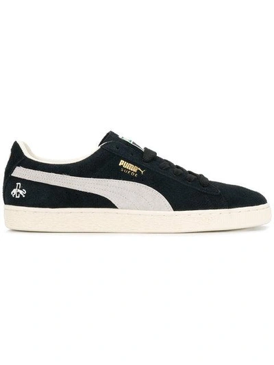 Shop Puma Low Top Sneakers - Black