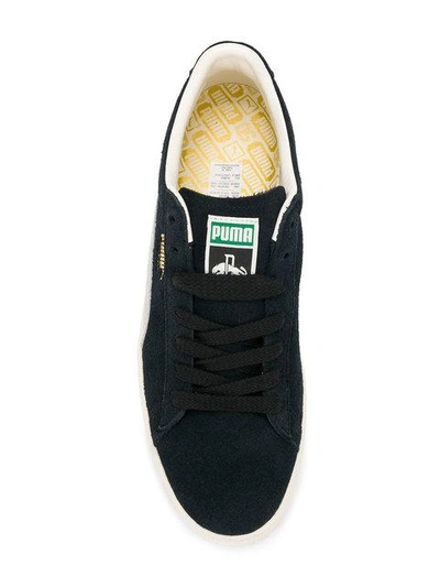 Shop Puma Low Top Sneakers - Black
