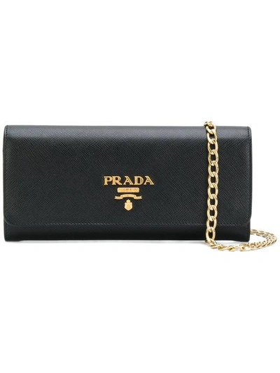 Shop Prada Logo-plaque Saffiano Leather Clutch In F0002 Black