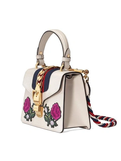 Shop Gucci Sylvie Embroidered Mini Bag In 8614 Gold
