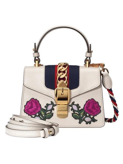 Shop Gucci Sylvie Embroidered Mini Bag In 8614 Gold