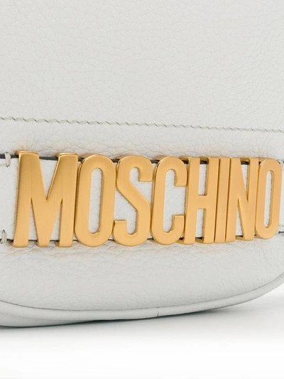 Shop Moschino Logo Plaque Shoulder Bag In White