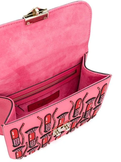 Shop Valentino Garavani Glam Lock Lipstick Shoulder Bag - Pink & Purple
