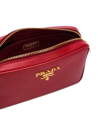 Shop Prada Saffiano Cross-body Bag In Red