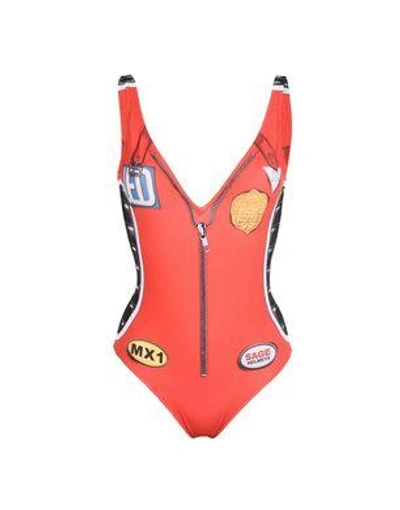 Shop Moschino One-piece Suits In Red