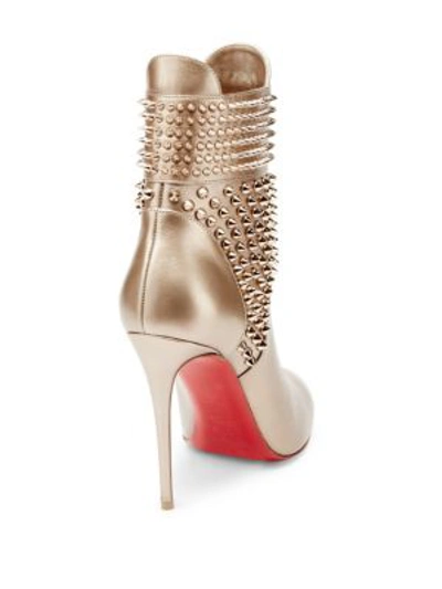Shop Christian Louboutin Studded 100 Leather Booties In Gold