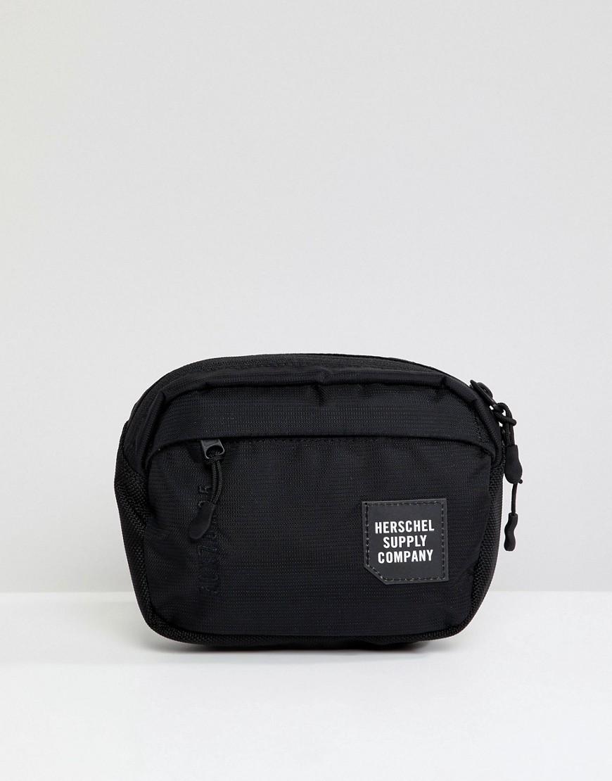 small black fanny pack