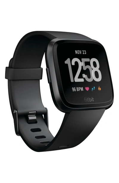 Shop Fitbit Versa Smart Watch In Black / Black