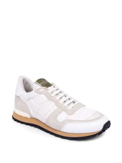 Shop Valentino Rock Running Sneakers In White