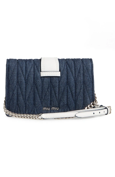 Shop Miu Miu Matelasse Denim Embellished Shoulder Bag - Blue In Blu/ Bianco