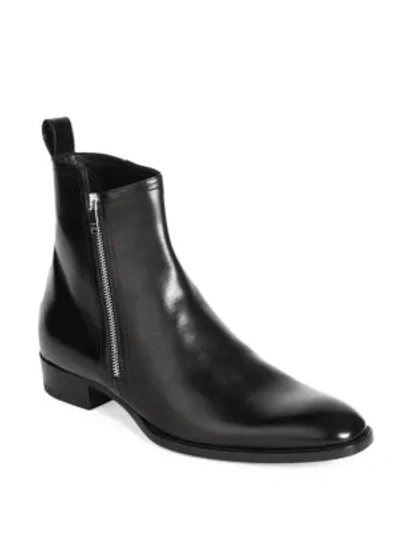 Shop Saint Laurent Wyatt Zippered Boots In Black