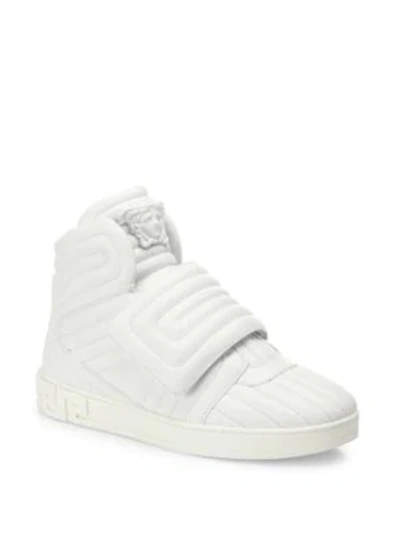 Shop Versace Eros Leather Quilted Greek Key High-top Sneakers In White