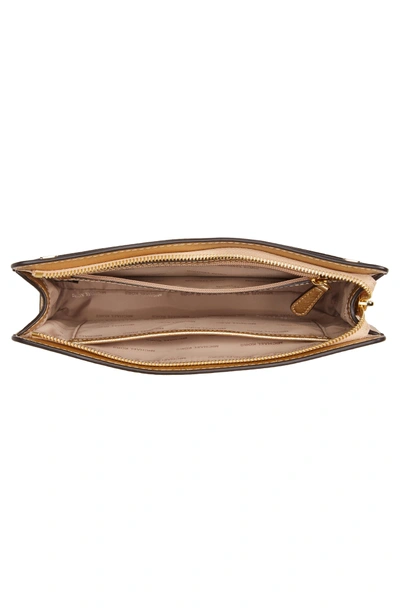 Shop Michael Michael Kors Large Jet Set Convertible Clutch - Metallic In Pale Gold