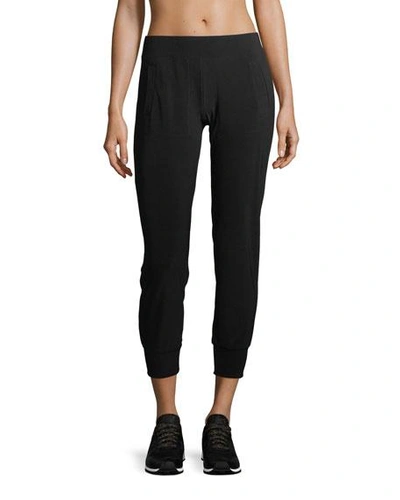 Shop Norma Kamali Pull-on Stretch-jersey Jogger Pants In Black