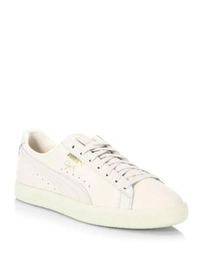 Shop Puma Clyde Natural Leather Sneakers In White