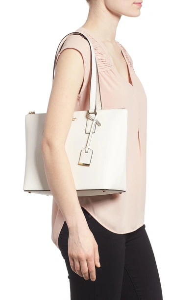 Shop Kate Spade Cameron Street - Small Lucie Leather Tote - White In Cement