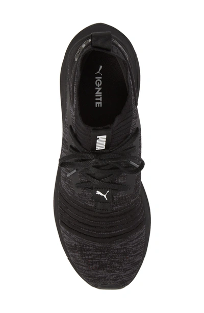 Shop Puma Ignite Limitless Sr Evoknit Sneaker In Black
