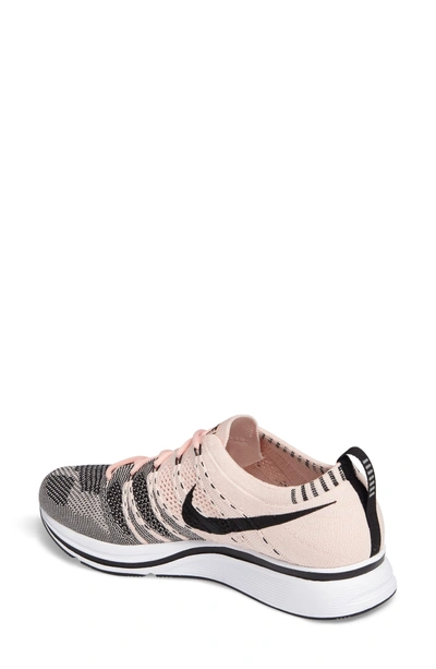 Shop Nike Lab Flyknit Trainer Sneaker In Sunset Tint/black-white