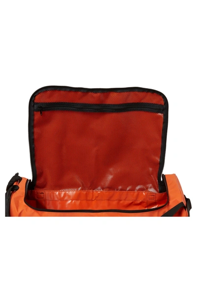 Shop Helly Hansen New Classic Large Duffel Bag - Orange In Spray Orange